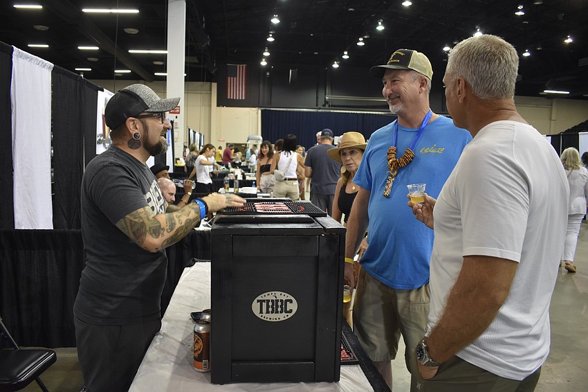 Josh Theurber of Tampa Bay Brewing Co. discusses the company's beers with Tom Scarpinato and Mark Aschenbrenner.