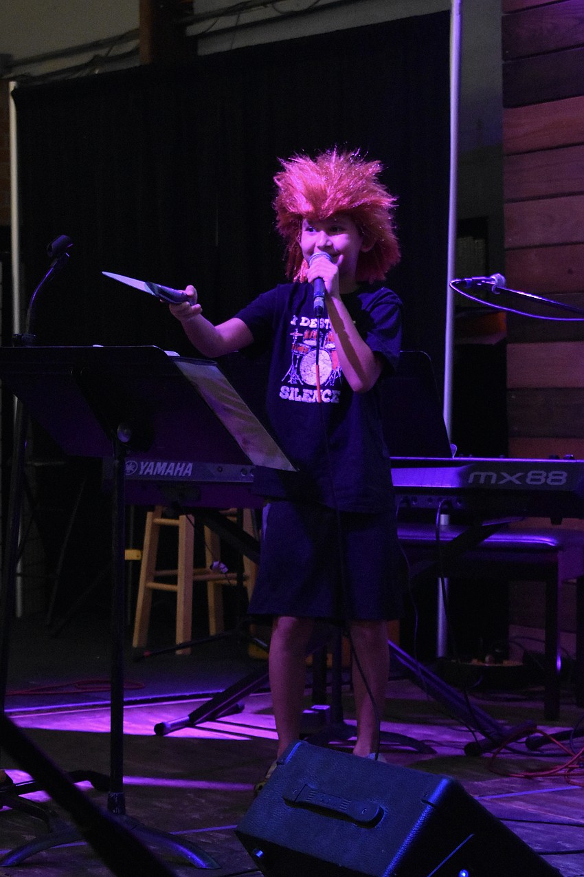 Lilz Reid takes to the stage to sing Psycho Killer by Talking Heads.