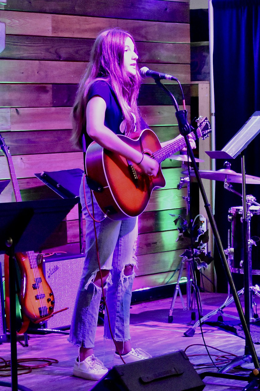 13-year-old Harper Weyant offers a solo performance.