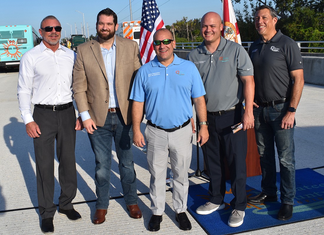 Manatee County Commissioners Raymond Turner, James Satcher, Kevin Van Ostenbridge, Jason Bearden and George Kruse celebrated the opening of the 44th Avenue Bridge over the Braden River on Aug. 7. Commissioners Amanda Ballard and Mike Rahn were not in attendance.
