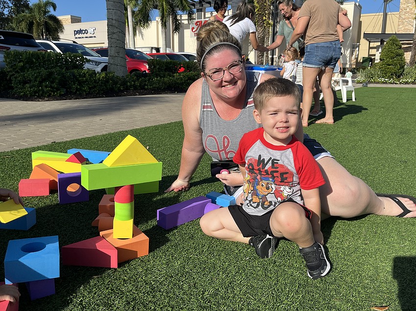 Sarasota's Meagan Whitt watches in awe as her 3-year-old son Dawson Whitt builds a tower from blocks.