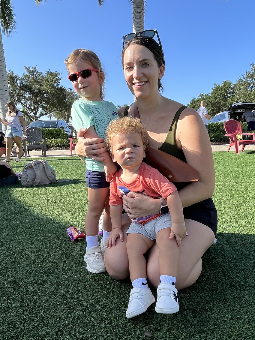 Sarasota 2-year-old Maya Kandefer takes a break from playing with her mom Kaitlin Kandefer and 1-year-old brother Jack Kandefer.
