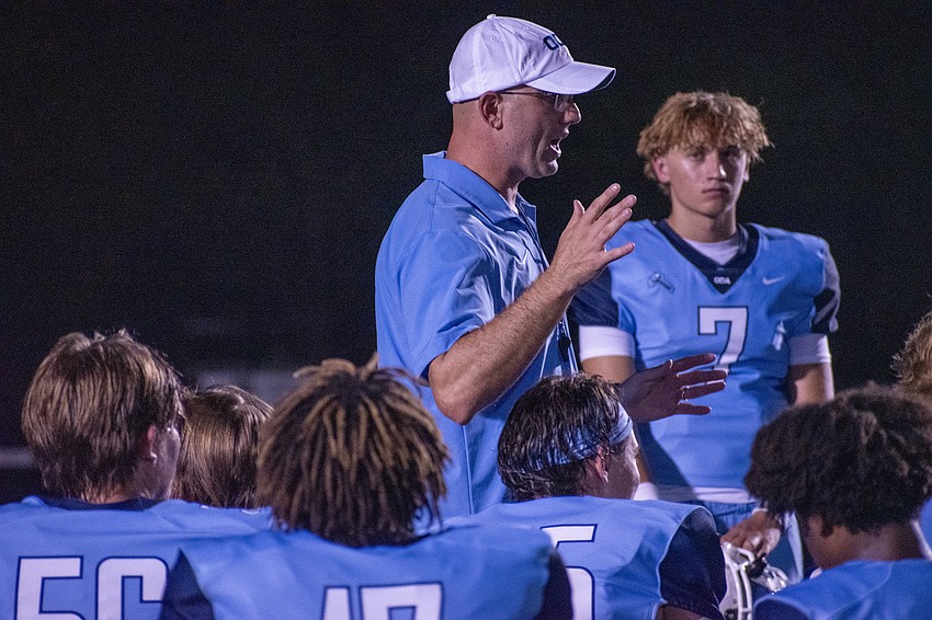 ODA Head Coach Rob Hollway talks to his team after a 42-0 win over Berean Christian. Hollway said the win was a good start to the season, but is looking forward to the challenge Oasis High presents next week.