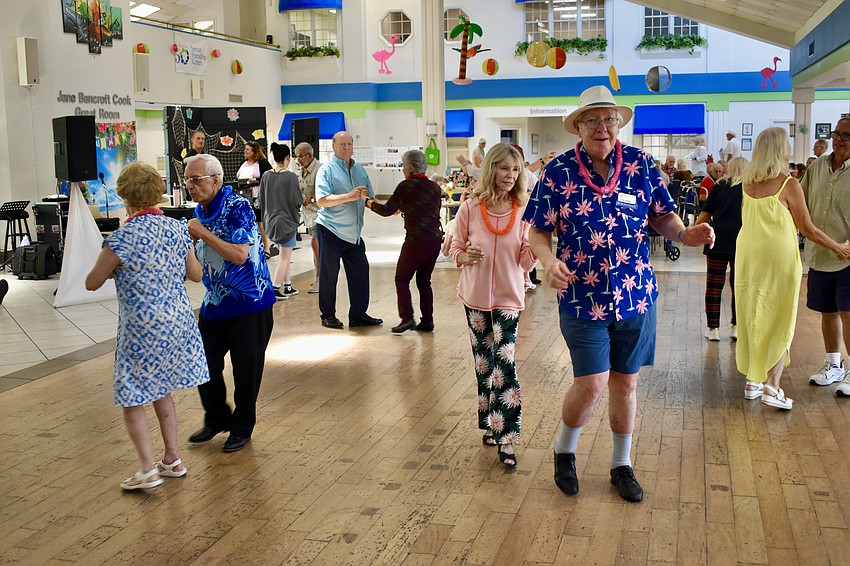 Guests at the event take to the dance floor.