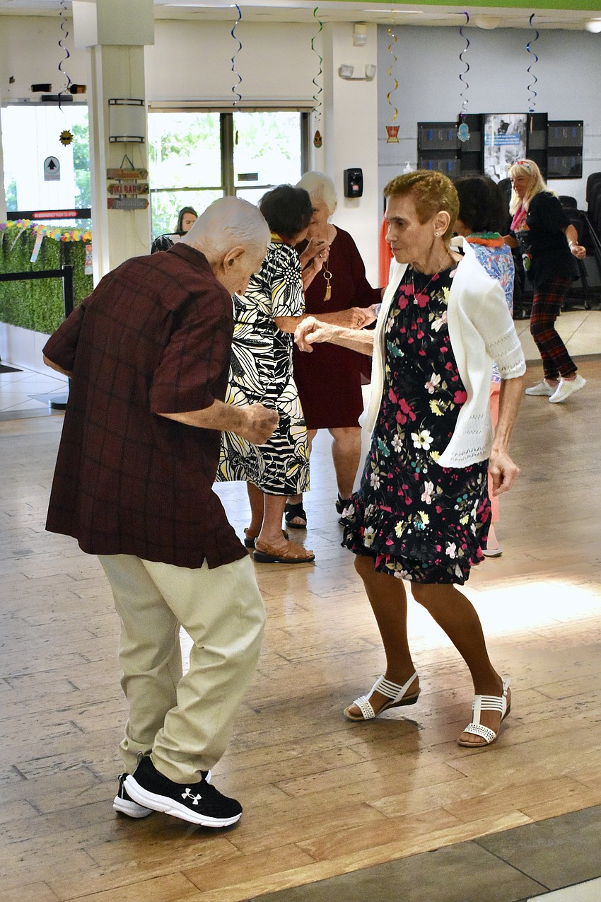 Harry and Maryann Martinucci get moving.