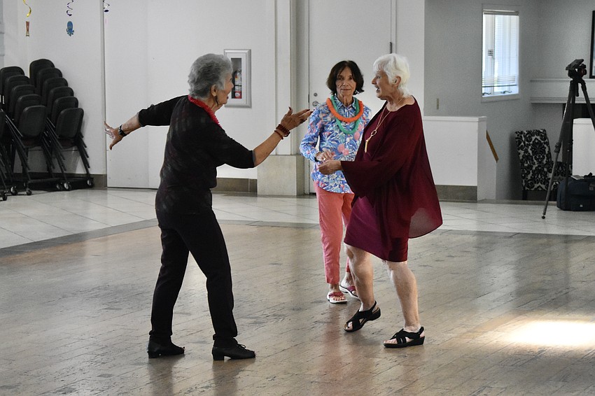 Marie Billups, Teresa Siciliano and Joy Wiltzius enjoy dancing together.