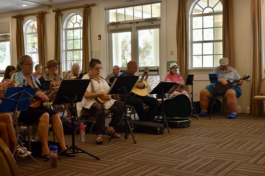 Aug. 26 is Play Music on the Porch Day. It's too hot outside, so residents gather inside Lakewood Ranch Town Hall.