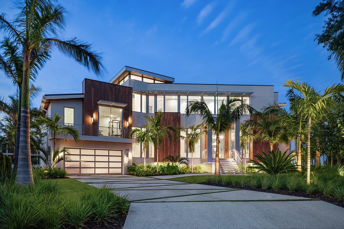 This Bay Isles modern home on Longboat Key, designed by DSDG Architects, recently won the Aurora Award for Custom Home of the Year (5,000 sq ft – 10,000 sq ft) at the South Eastern Builders Conference. It features resilient deign aspects such as fake wood made of aluminum and solar panels.