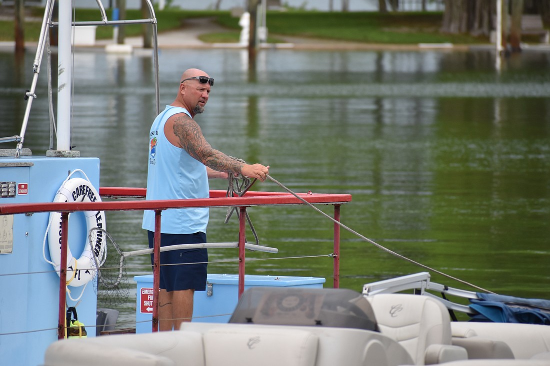 Bayfront Park on TuesdayCaptain Bobby Chiodini ties down the historic tour boat the Carefree Learner, also known as Sarasota High School’s “floating classroom,” at Bayfront Park on Tuesday.