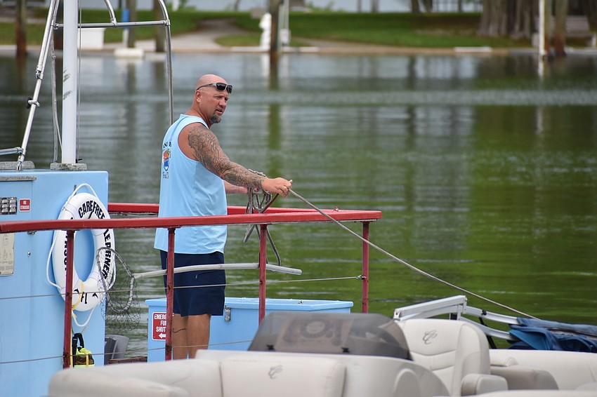 Bayfront Park on TuesdayCaptain Bobby Chiodini ties down the historic tour boat the Carefree Learner, also known as Sarasota High School’s “floating classroom,” at Bayfront Park on Tuesday.
