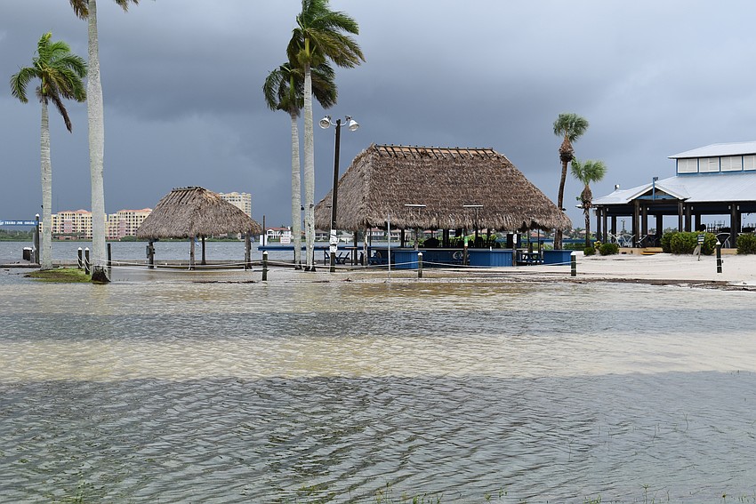 Caddy's tiki hut is engulfed by the Manatee River on Aug. 30 after Hurricane Idalia passes.