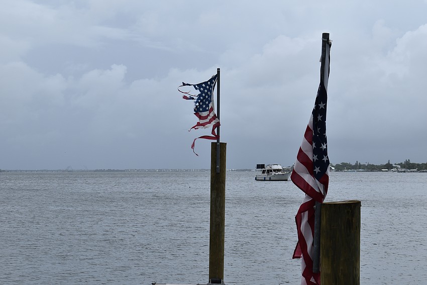 American flags along the Manatee River didn't fare well during Hurricane Idalia on Aug. 30.