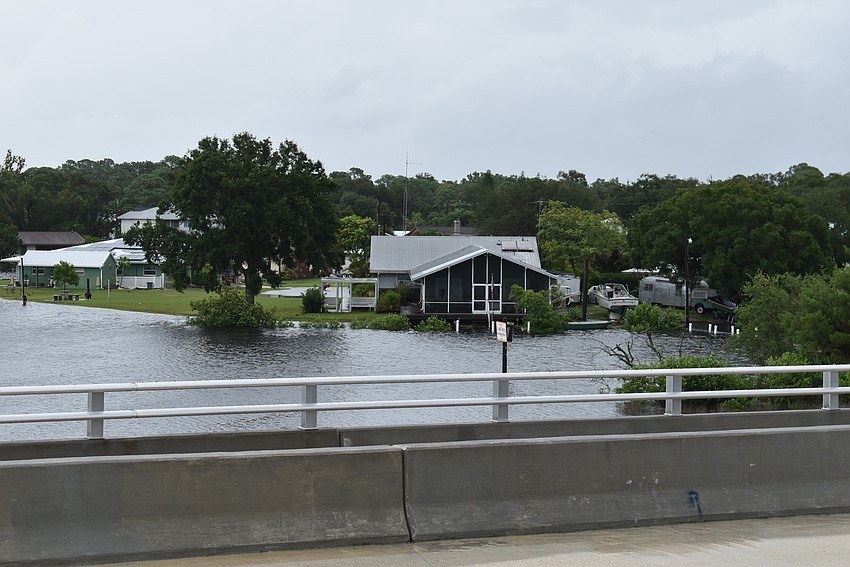 The Braden River rises to threaten houses Aug. 30 after Hurricane Idalia passes. The photo was taken over the 44th Avenue bridge.