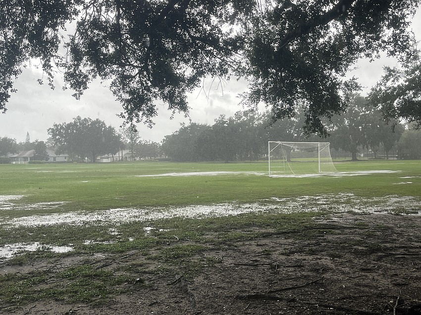 The soccer fields at Summerfield Community Park are flooded.