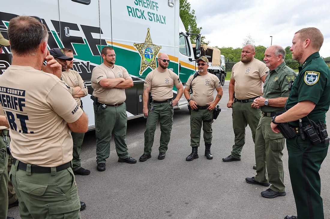 Flagler County Sheriff Rick Staly speaks with Emergency Response Team members. Photo courtesy of the FCSO