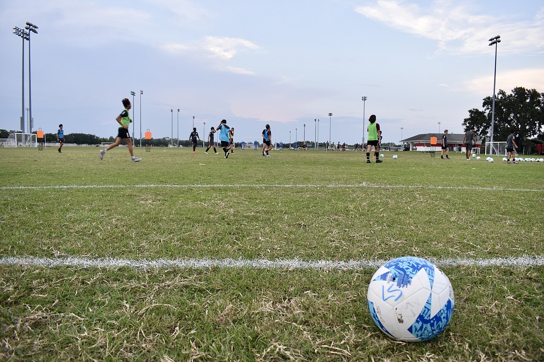 The Braden River Soccer Club practices at Lakewood Ranch Park. County staff wants to add two new turf fields to the park.