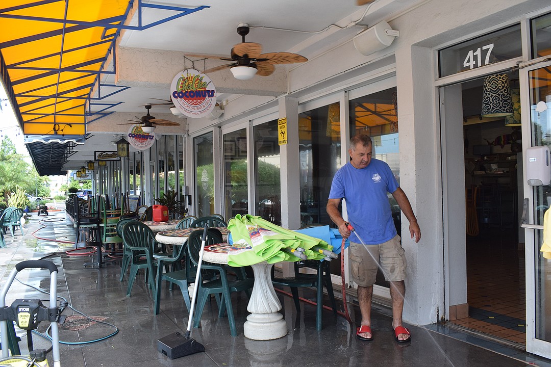 Businesses on St. Armands Circle clean up after Hurricane Idalia
