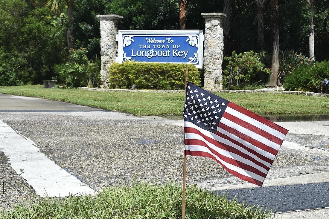 Flags fly across all seven miles of Longboat Key on Sept. 11.