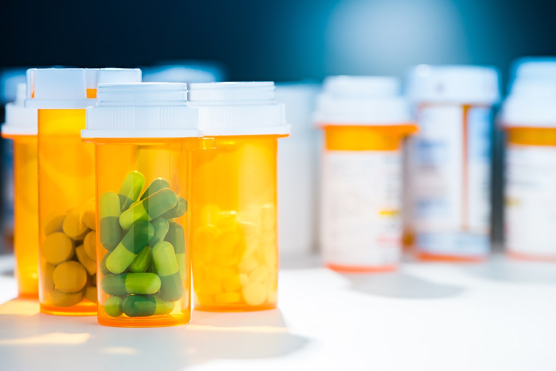 Prescription pill bottles. Photo from Adobe Stock