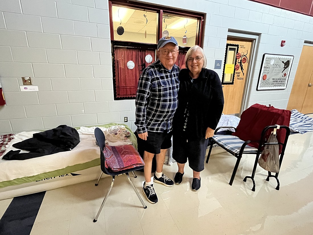 East County's Charles and Elaine Johnston evacuate to Freedom Elementary School due to concerns of storm surge at their home during Hurricane Idalia.