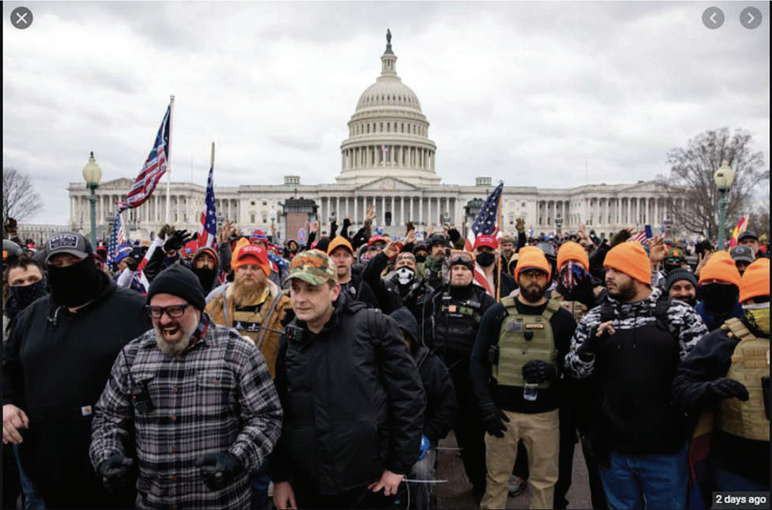 Joseph Biggs (in the plaid shirt) is seen in video footage shared to ABC Action News by a member of the Proud Boys. Screenshot via the States Attorney's Office for the District of Columbia