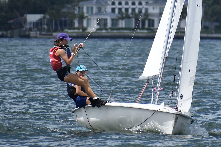 McRae Busey of Florida Yacht Club in Jacksonville hikes on Club 420 she is sailing with Mary Katherine Monahan.