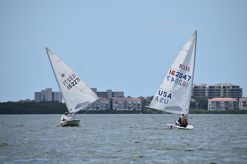 John Wood of St. Petersburg Yacht Club and Rick Ericson of St. Petersburg Yacht Club sail Lasers.