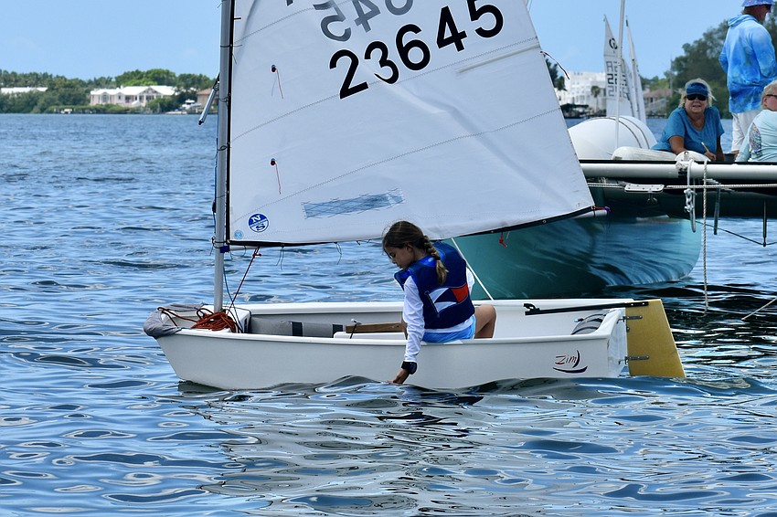 Harper Ross (Optimist Green) of the Davis Island Race Team takes a moment to enjoy the water.