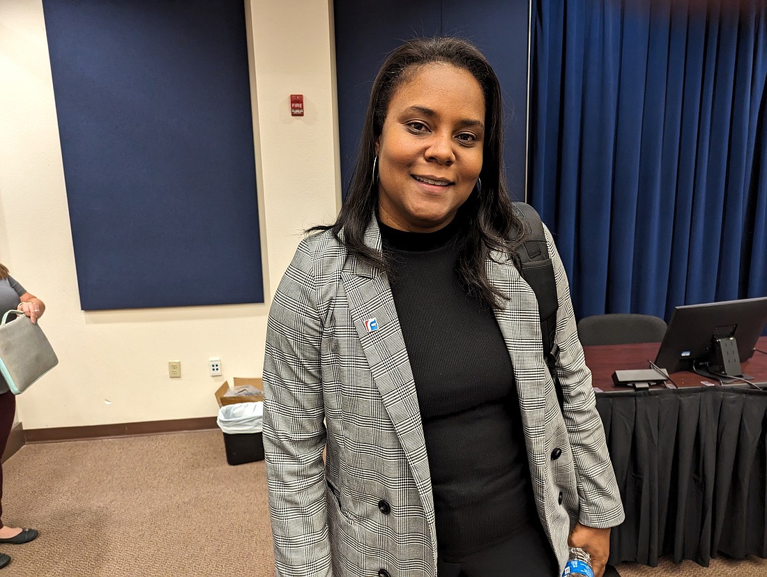 LaShakia Moore is all smiles after the Flagler County School Board voted to make her the district's new superintendent.