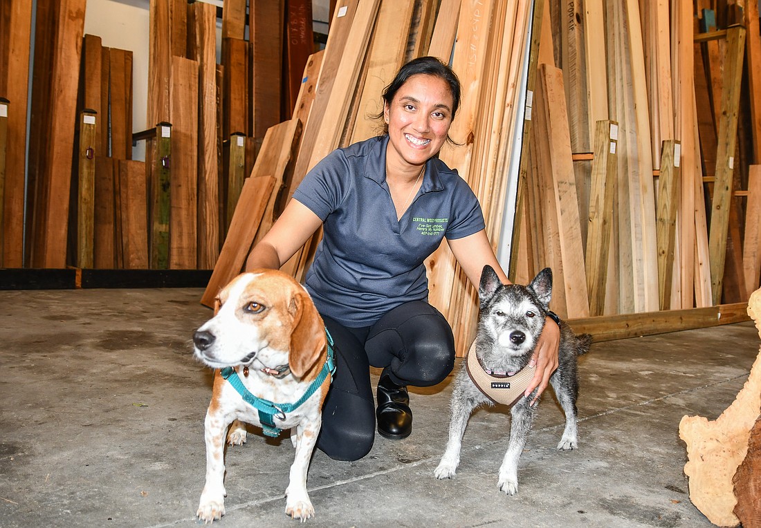 Devika Maharaj runs the shop with the help of her two dogs, Rusty and Roxy, who are always keeping her company.