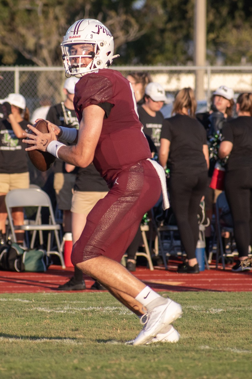 Braden River junior quarterback Lucas Despot looks for an open receiver. The Pirates need to score when they have the opportunity in the red zone.