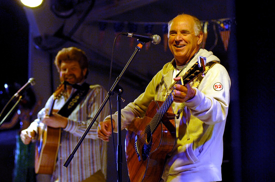 Jimmy Buffett performs a USO concert in 2008. Photo courtesy of Wikimedia Commons/U.S. Navy