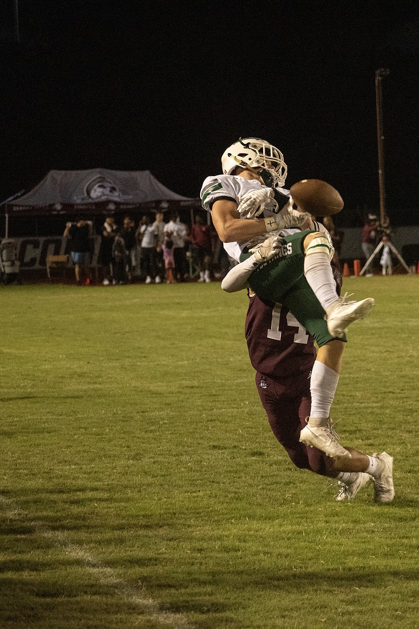 Braden River senior Jevon Moore (14) lays a hit on Lakewood Ranch senior Tyler Lakin. The Pirates' defense needs to get stops after its offense scores in order to play complementary football.