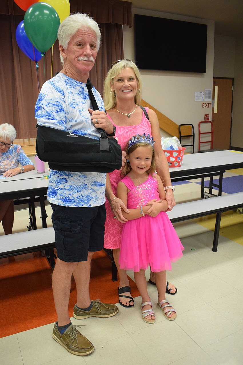 Charlie Hill and Janine Hill look forward to meeting first grader Cora Comeaux's teacher.