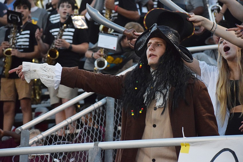 Braden River High School senior Alex den Boggende wears a full pirate costume to the game. Students either dressed as pirates or wore maroon, one of the school's colors.