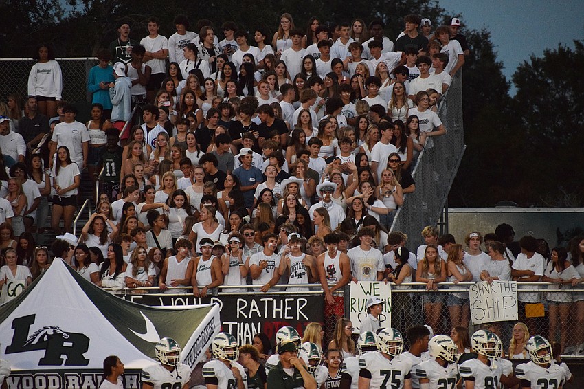 Lakewood Ranch High School students pack the student section of the stands at the football game against Braden River High School. Although it was an away game, there wasn't enough space for all the students who attended.