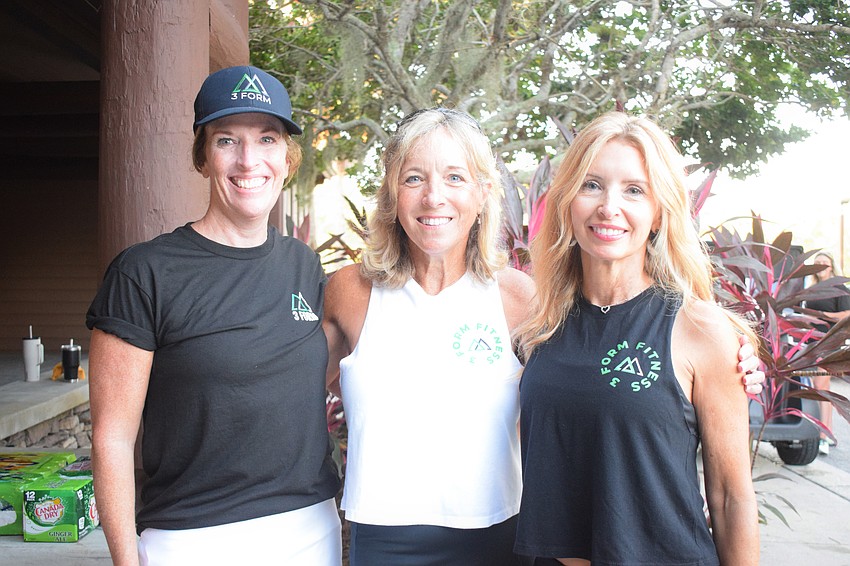 Lakewood Ranch's Tracy Day, Carol Frazier and Mary Feld volunteer at 3Form Fitness' charity golf tournament. 