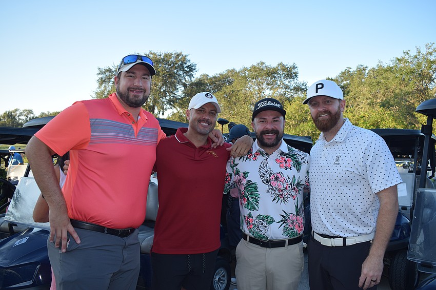 Parrish's Jared Kuchta, Sarasota's Daniel Aviles, Sarasota's Miguel Nieves and Parrish's Phil Logan participate in 3Form Fitness' charity golf tournament to support its owner, Michael Demarski, as well as the three nonprofits benefitting from the tournament.