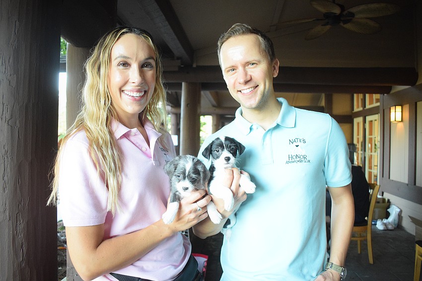 Lakewood Ranch's Brittany Herbst and her husband, Robby Herbst, are fostering puppies for Nate's Honor Animal Rescue, which is one of three nonprofits benefitting from the 3Form Fitness charity golf tournament.