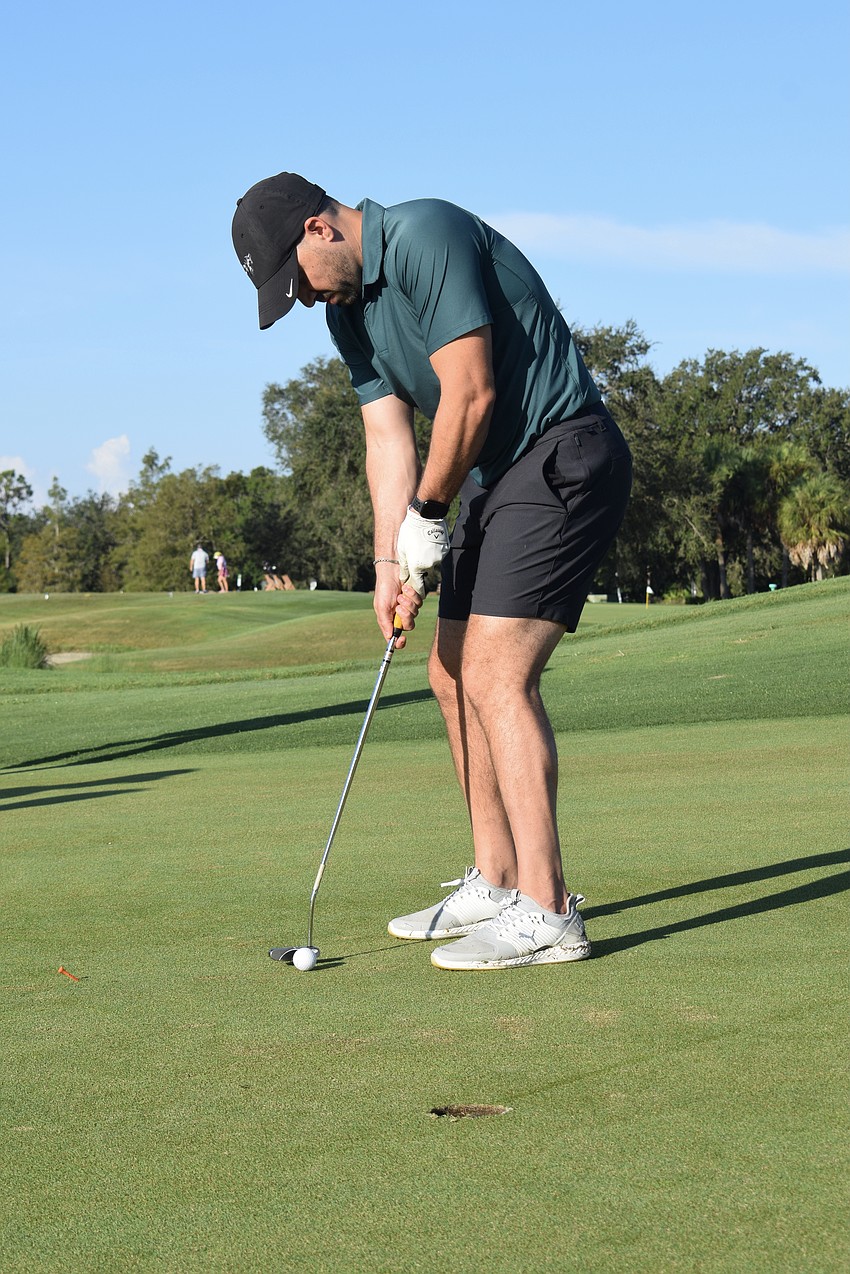 Sarasota's Josh Papapietro lines up his putt.