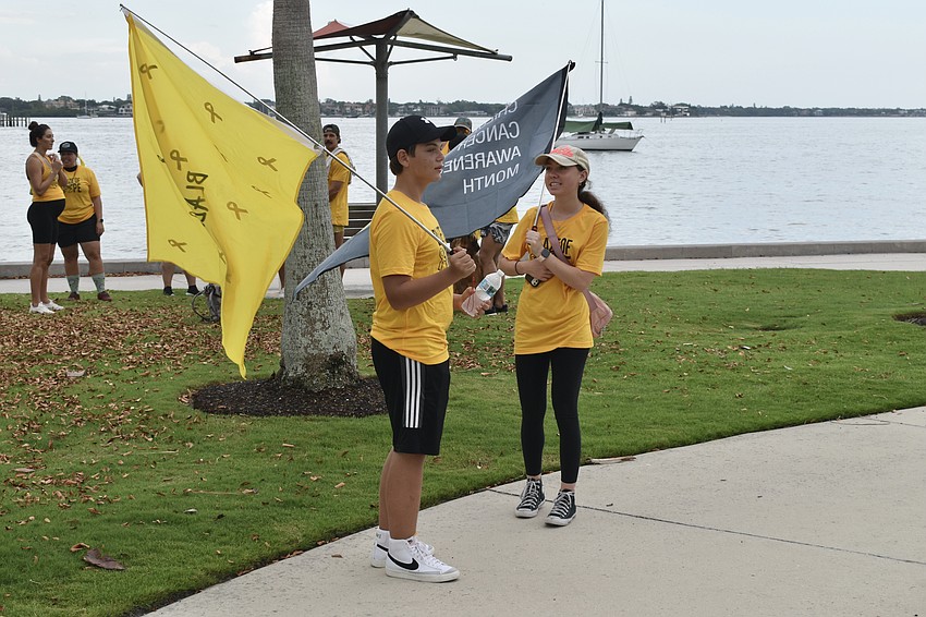 Andrew Springer, 15, and 17-year-old Gemma Davies prepare to take the walk.