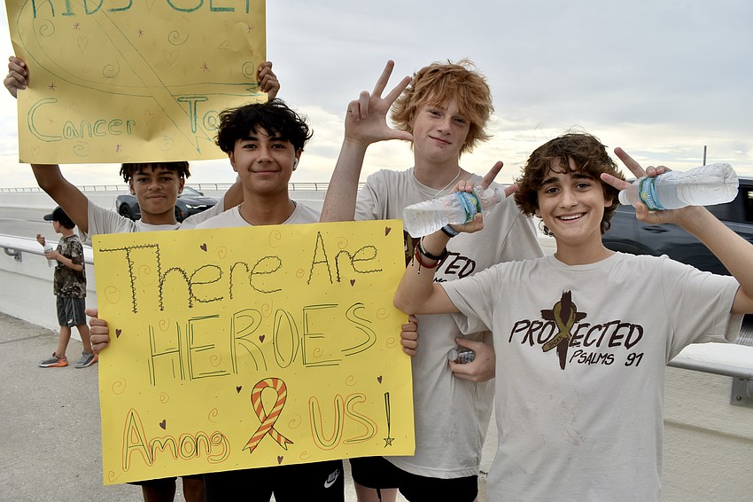 Tristan Sauveur, Brady Bench, Joshua Small, and cancer fighter Landon Chandler, all 14 years old.