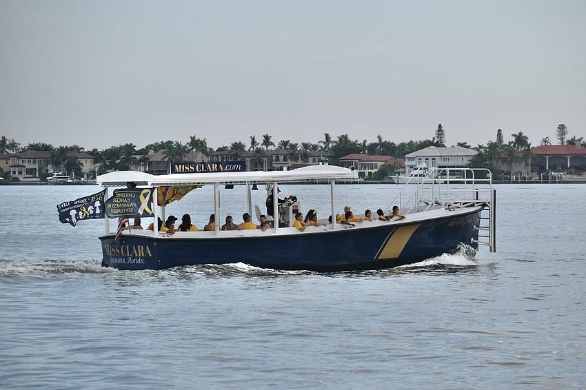 Participants take a trip with Miss Clara Boat Tours after the walk.