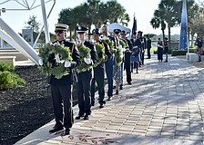Members of the Sarasota Police Department and others line up for the wreath placement ceremony.