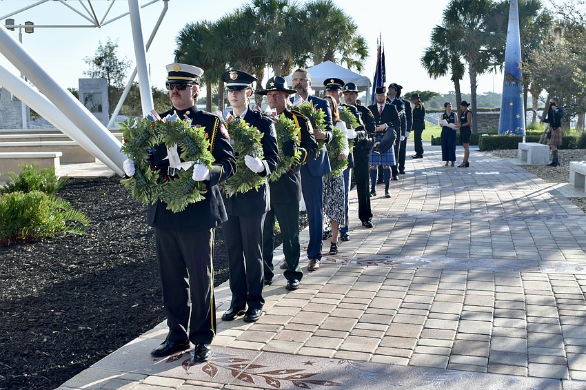 Members of the Sarasota Police Department and others line up for the wreath placement ceremony.