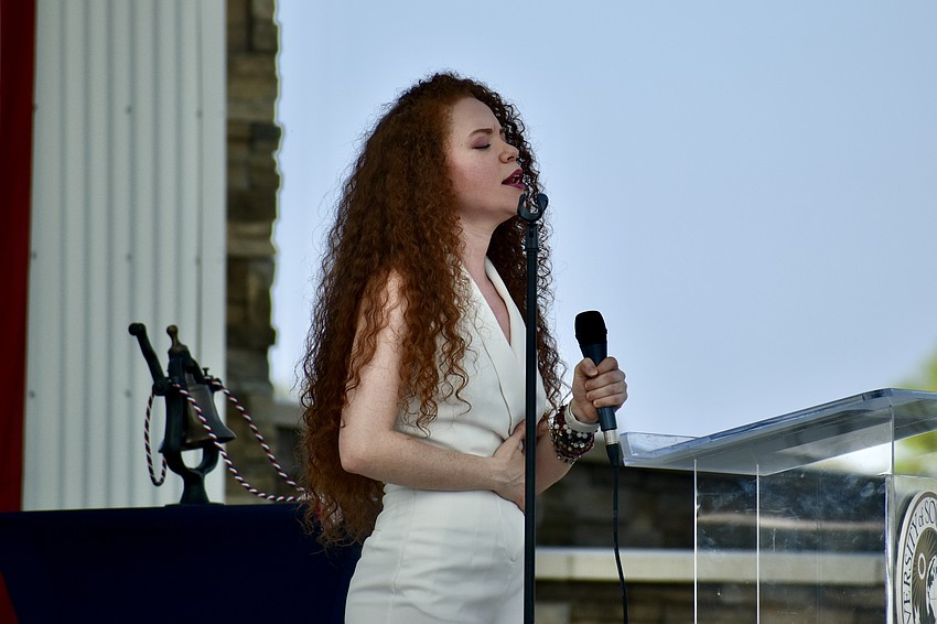 Daniella Mass, an America's Got Talent semifinalist, sang The Star Spangled Banner.