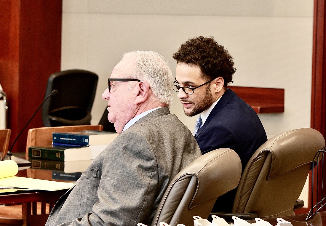 Brenan Hill (right) and his attorney, Gerald Bettman. Photo by Sierra Williams