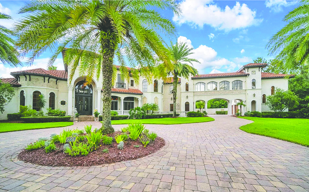 Mediterranean style two-story home in Pablo Creek Preserve. Features four bedrooms, six full and two half-bathrooms, office, theater, wine cellar, recreation room, elevator, summer kitchen, screened pool and patio.