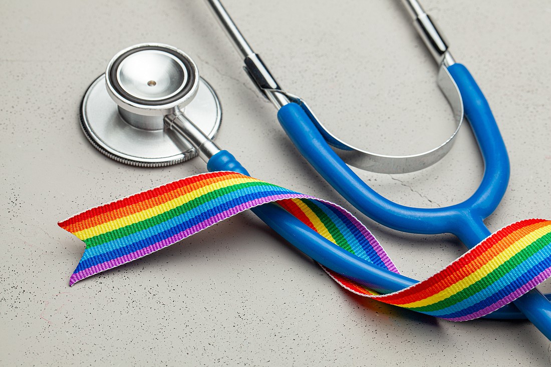 Stethoscope and LGBT rainbow pride ribbon. Photo from Adobe Stock