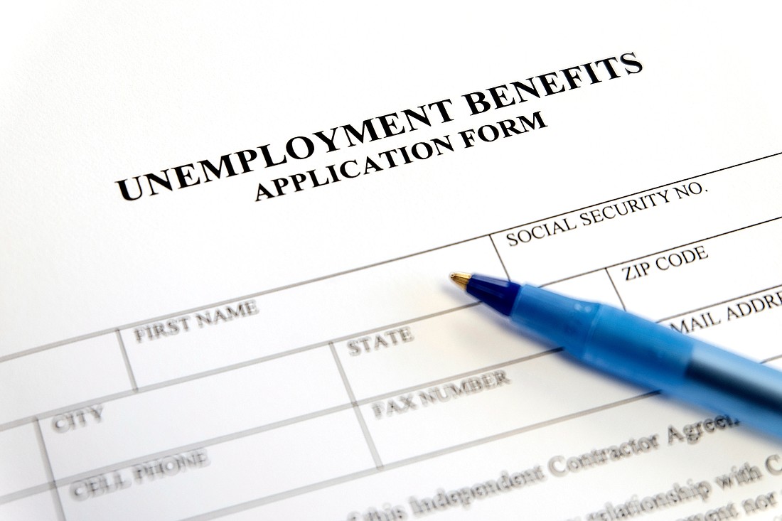 Written unemployment benefits application form. Photo from Adobe Stock